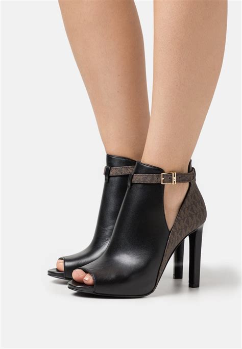 michael kors sneaker heels|michael kors high heels boots.